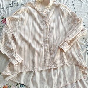 Red and white stripped minimalist blouse.